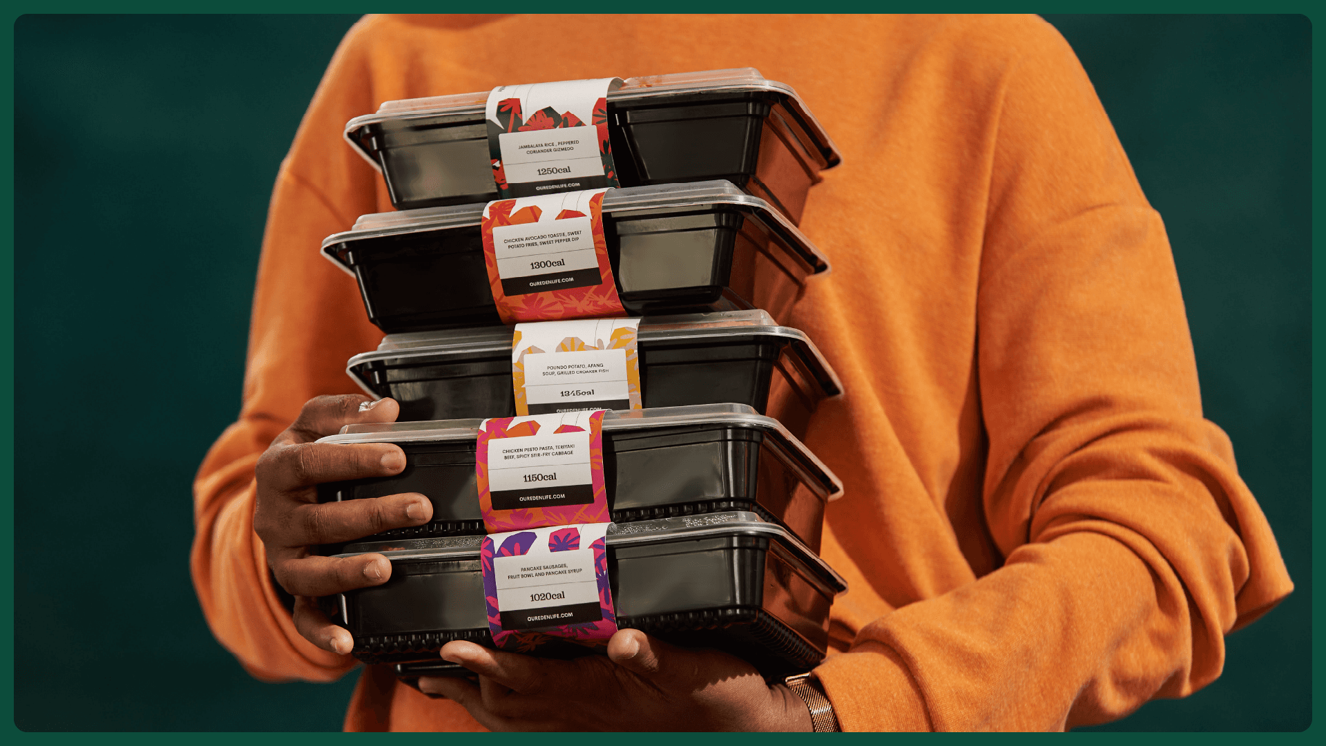 Stacked EdenLife meal containers with patterned labels